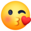 FACE THROWING A KISS emoji in Facebook's design style - Unicode 1F618