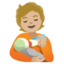 PERSON FEEDING BABY emoji with medium-light skin tone skin tone