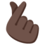 HAND WITH INDEX FINGER AND THUMB CROSSED emoji with dark skin tone skin tone